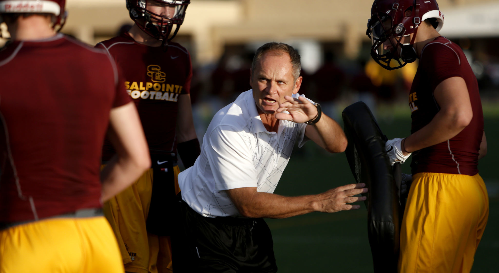 Sapolinte HS football coach Dennis Bene